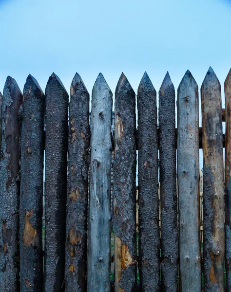 A fragment of a wooden fortress made of logs. — Stock Photo, Image