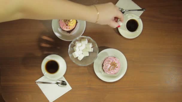 Female Hand Puts Sugar Cubes Cups Hot Coffee View — Stock Video