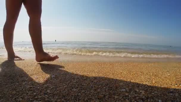 Women Legs Sandy Beach Which Wave Washes Away Footprints — Stock Video