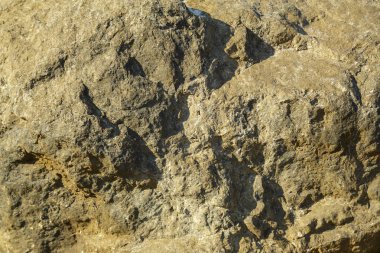 Taş kayaların parçası yakın çekim. Doku. Yatay çerçeve