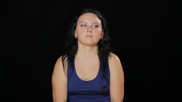 A young woman does exercises with eyes in the form of a rhombus — Stock Video