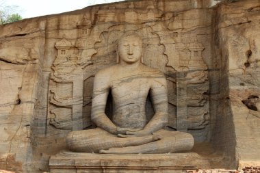 Arguably the most iconic site of Buddha Statue in Polonnaruwa, Gal Vihara. Taken in Sri Lanka, August 2018. clipart