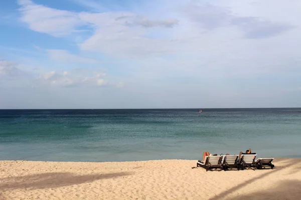 Relaxin in white sand beach and quiet wave of Dutch Bay in Trincomalee. Taken in Sri Lanka, August 2018.