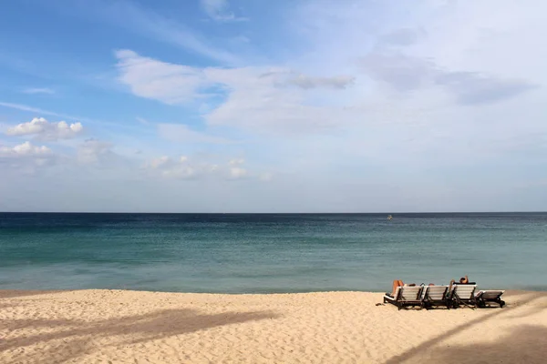 Relaxin in white sand beach and quiet wave of Dutch Bay in Trincomalee. Taken in Sri Lanka, August 2018.