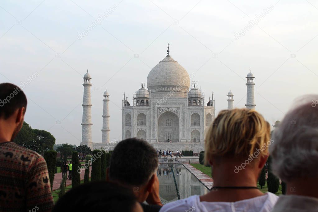 The tourists taking photos of Taj Mahal in a crowd. Taken in Agra, India, August 2018