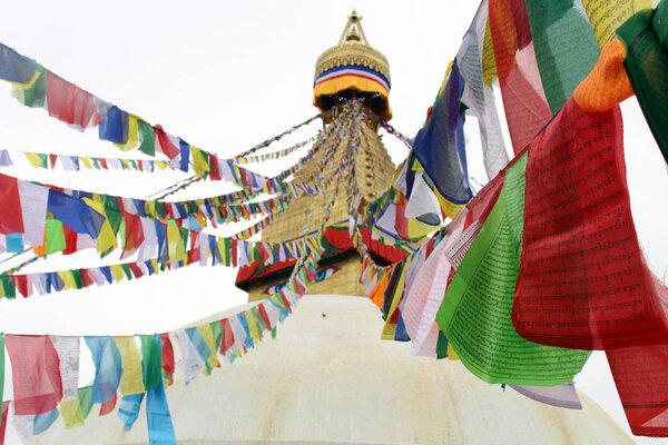 The colorful prayer flags of Boudhanath Stupa in Kathmandu. Taken in Nepal, August 2018.