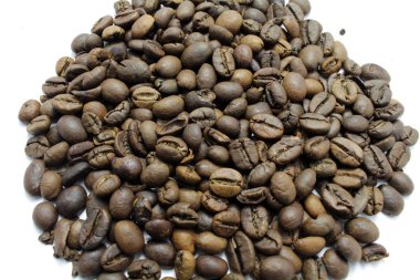 Indonesian roasted coffee beans, your source for a cup of coffee clipart