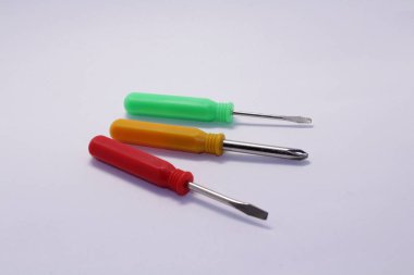 Various screwdrivers, used for screwing and unscrewing clipart