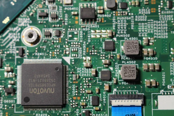 Closeup view at laptop motherboard and semiconductors components — Stock Photo, Image