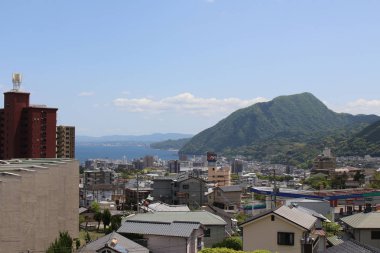 Oita ve deniz kıyısında Beppu manzara