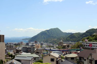 Oita ve deniz kıyısında Beppu manzara