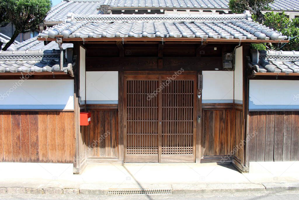 Wooden wall and traditional house door in Asuka village of Nara. Taken in September 2019.