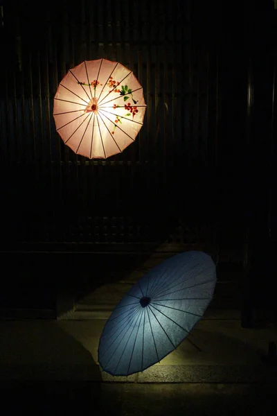 Umbrellas and lanterns around Japanese old town Oka during lantern festival. Taken in September 2019.