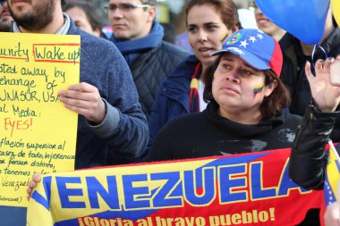 Venezuelans in Portugal Protest Against Venezuelan President Nicols Maduro in Porto, Portugal on 02/22/2014 clipart