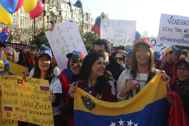 Venezuelans in Portugal Protest Against Venezuelan President Nicols Maduro in Porto, Portugal on 02/22/2014 clipart