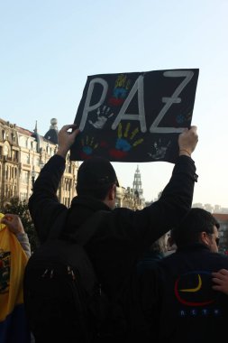 Venezuelans in Portugal Protest Against Venezuelan President Nicols Maduro in Porto, Portugal on 02/22/2014 clipart