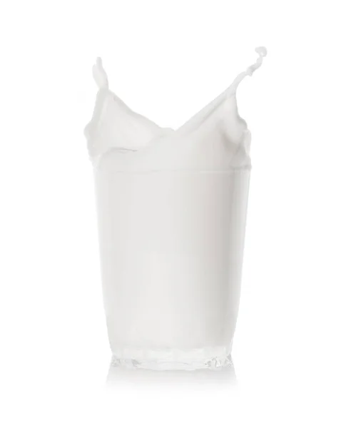 Splash in transparent glass of the milk — Stock Photo, Image