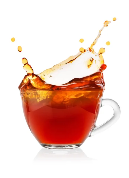 Splash in cup of black tea — Stock Photo, Image