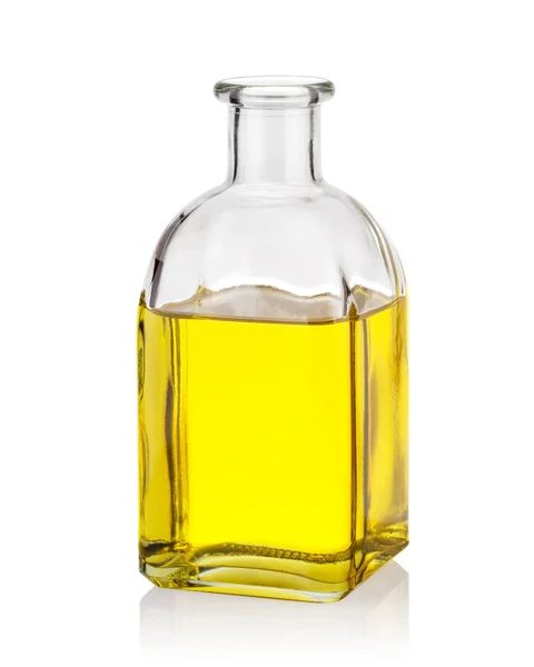 Gele olie in glazen fles — Stockfoto