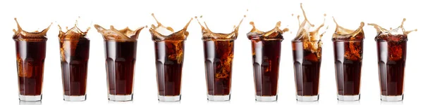Stänk av cola i ett glas — Stockfoto