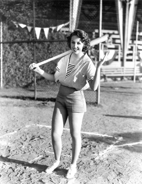 Woman ready to play baseball