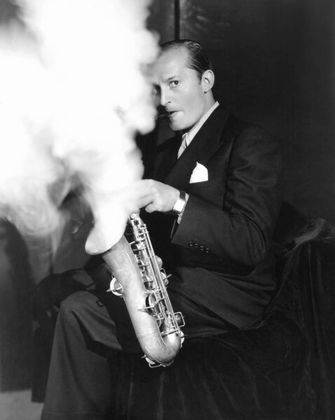Musician Blowing Smoke Out Saxophone Stock Picture