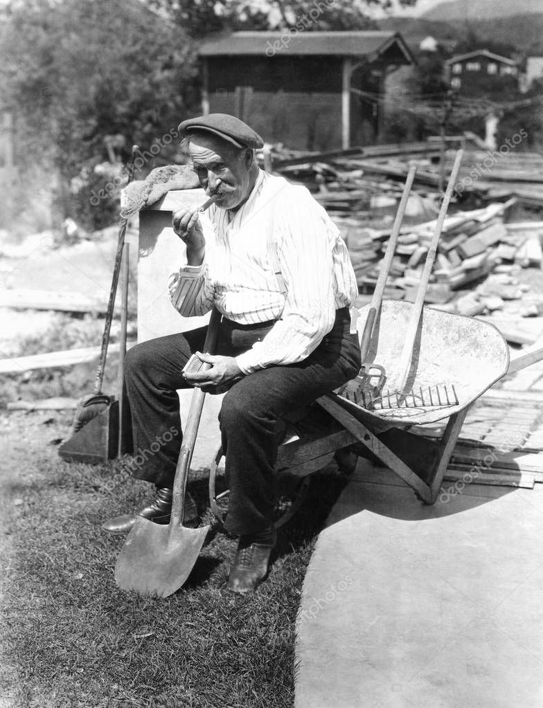 Construction worker taking a cigar break