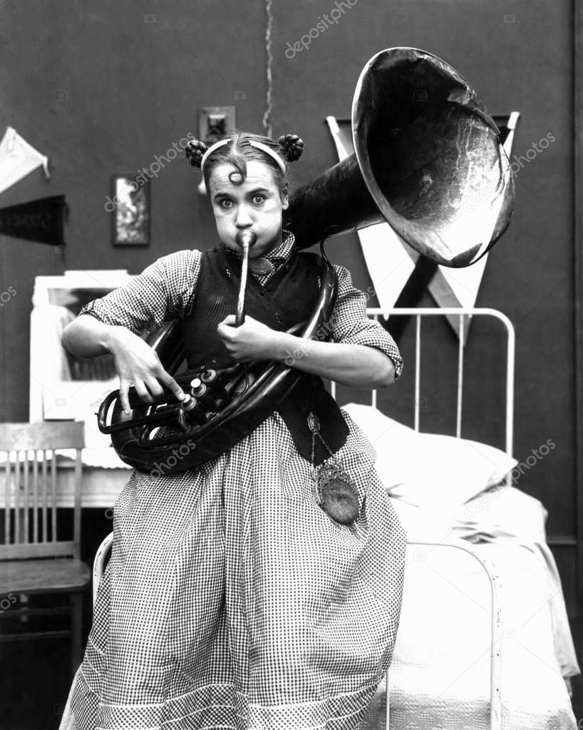 Woman  practice trombone,black and white