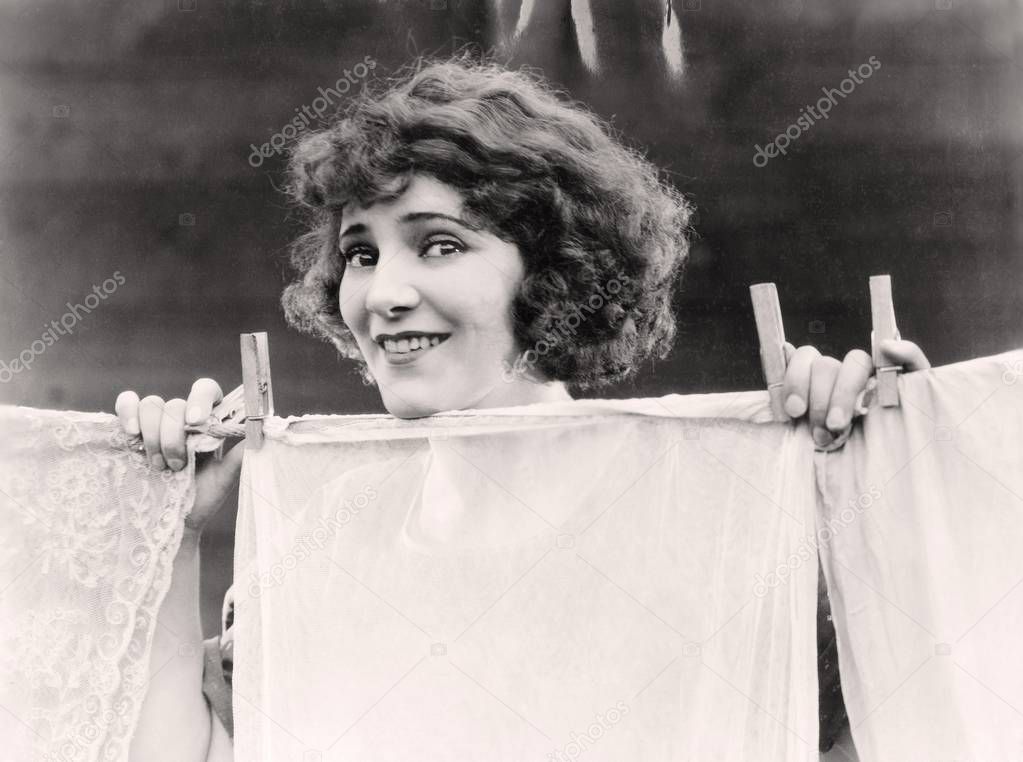 Woman hanging the laundry out to dry