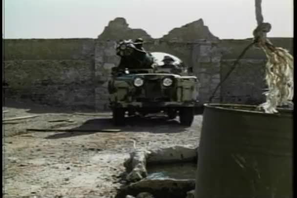 Military Vehicle Stopping Short Fort 1970S — Stock Video