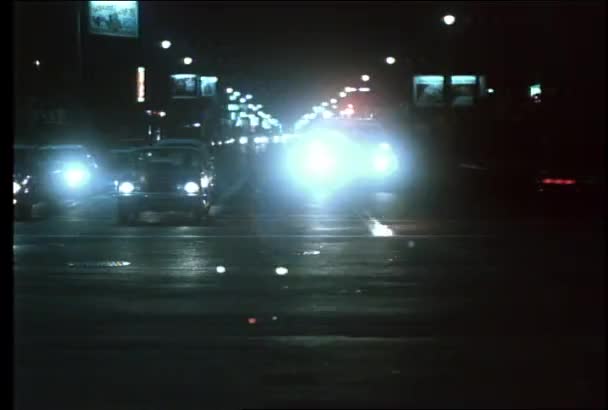 Ambulance Driving City Street Night 1970S — Stock Video