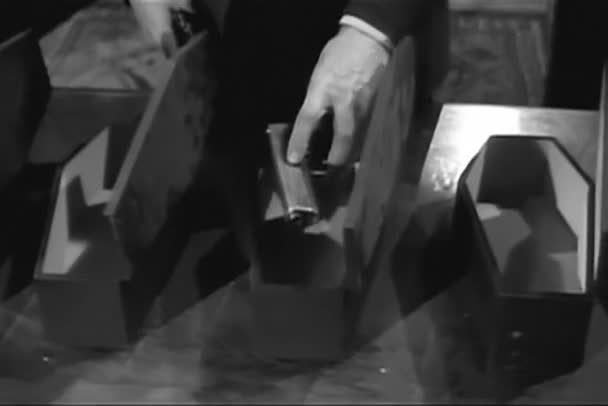 Man Hiding Gun Miniature Wooden Coffin 1950S — Stock Video