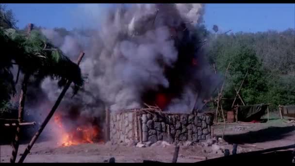 Wide Shot Stone Cabin Exploding Rural Setting 1970S — Stock Video