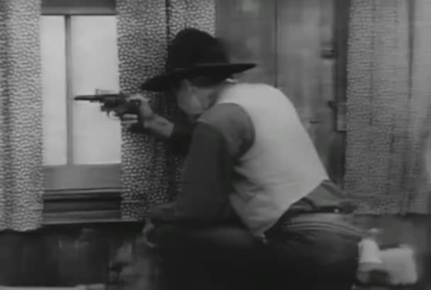 Interior Shot Cowboy Shooting Cabin Window 1930s Video By C Everett225 Stock Footage Interior Shot Cowboy Shooting Cabin Window 1930s Video By C Everett225 Stock Footage