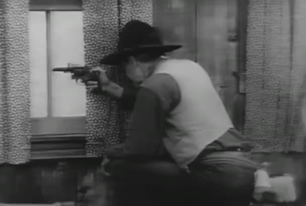 Interior Shot Cowboy Shooting Cabin Window 1930S — Stock Video