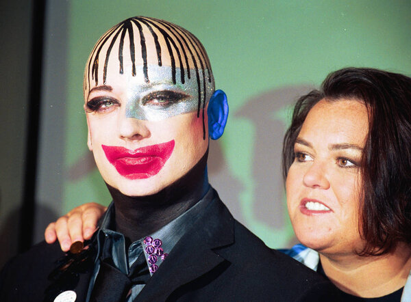 Rosie O 'Donnell and Boy George at event to publicize the sale of tickets for the show TABOO, NY 9 / 3 / 2003, by Janet Mayer

