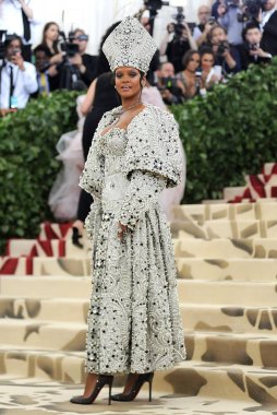 Rihanna at arrivals for Heavenly Bodies: Fashion and the Catholic Imagination Met Gala Costume Institute Annual Benefit - Part 3, Metropolitan Museum of Art, New York, NY May 7, 2018. Photo By: Kristin Callahan/Everett Collection clipart