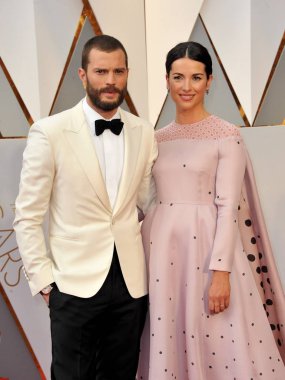Jamie Dornan, Amelia Warner, 89th Academy Awards Oscar 2017-gelenler 3, Hollywood ve Highland Center 'da Dolby Theatre, Los Angeles, CA Şubat 26, 2017 için gelenler. Fotoğraf: Elizabeth Goodenough/Everett Collection