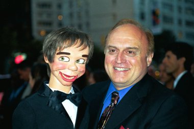 Alan Semok (ventriloquist who coached Adrien Brody for this film) and his dummy Woodrow at NY premiere of DUMMY, 9/10/2003  clipart