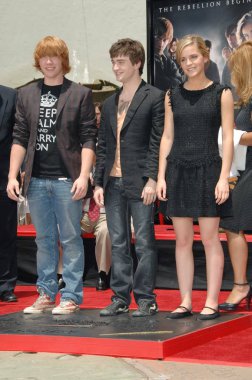 Rupert Grint, Daniel Radcliffe, Emma Watson Harry Potter ayak-baskı ve Wand-baskı töreni için indüksiyon töreni, Grauman ' 's Çin Tiyatrosu, Los Angeles, CA, Temmuz 09, 2007. Fotoğraf: Dee Cercone/Everett Collection