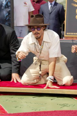 Johnny Depp Johnny Depp için el izi ve ayak izi töreni için basın toplantısında, Grauman Çin Tiyatrosu, Los Angeles, Ca, Eylül 16, 2005. Fotoğraf: Michael Germana / Everett Koleksiyonu