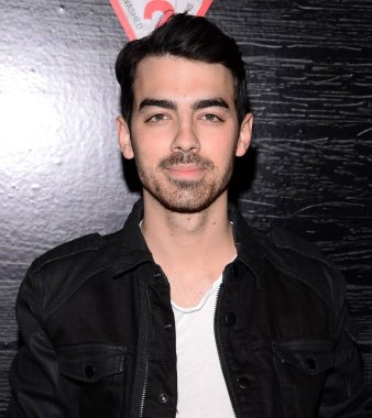 Joe Jonas at arrivals for GUESS Fall 2014 Road to Nashville Collection Launch Party, Center 548, New York, NY February 11, 2014. Photo By: Eli Winston/Everett Collection