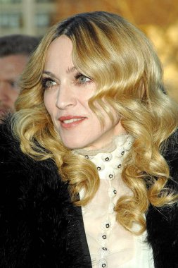 Madonna at arrivals for Special Screening of ARTHUR AND THE INVISIBLES for Robin Hood, Tribeca Cinemas, New York, NY, January 11, 2007. Photo by: George Taylor/Everett Collection clipart