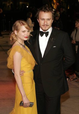 Michelle Williams (wearing Vera Wang), Heath Ledger at arrivals for Vanity Fair Oscar Party, Mortons Restaurant in West Hollywood, Los Angeles, CA, Sunday, March 05, 2006. Photo by: Jeff Smith/Everett Collection clipart