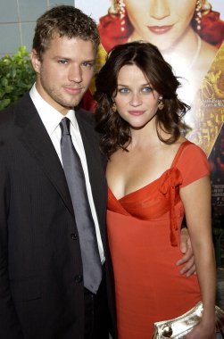 Reese Witherspoon and husband Ryan Phillippe at the premiere of VANITY FAIR at the Clearview Theater on August 16, 2004 in New York.   (Photo by Brad Barket/ Everett Collection) clipart