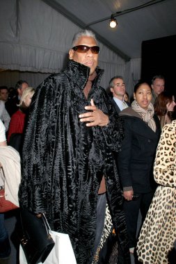 Andre Leon Talley (carrying a Louis Vuitton attache case) at fashion show for Michael Kors Fall 2006 Collection - Olympus Fashion Week, Bryant Park, New York, NY,  February 08, 2006. Photo by: Rob Rich/Everett Collection clipart