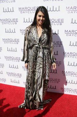 Kourtney Kardashian (wearing a Roberto Cavalli dress) at arrivals for Kourtney Kardashian Hosts The Marquee Dayclub Season Preview, Marquee Dayclub, Las Vegas, NV March 21, 2015. Photo By: James Atoa/Everett Collection clipart