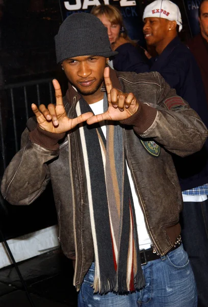 Usher at the world premiere of JAY-Z'S FADE TO BLACK at the The Ziegfeld theater on November 5, 2004 in New York. (Photo by Brad Barket/ Everett Collection)