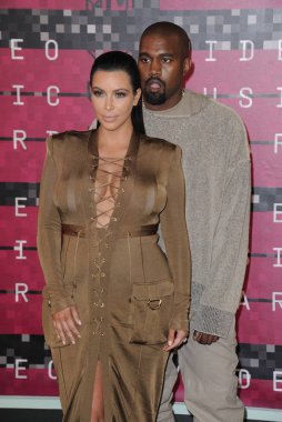 Kim Kardashian (wearing Balmain), Kanye West at arrivals for MTV Video Music Awards (VMA) 2015 - ARRIVALS 2, The Microsoft Theater (formerly Nokia Theatre L.A. Live), Los Angeles, CA August 30, 2015. Photo By: Dee Cercone/Everett Collection
