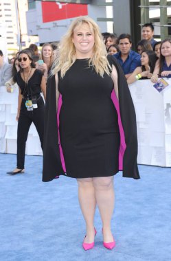 Rebel Wilson (wearing an Adrianna Papell dress) at arrivals for MTV Movie Awards 2015 - Arrivals 1, Nokia Theatre L.A. LIVE, Los Angeles, CA April 12, 2015. Photo By: Elizabeth Goodenough/Everett Collection